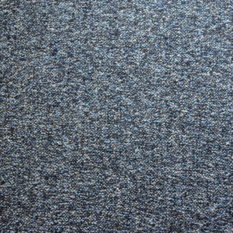 Agata fabric sample by Bolzan Letto, blue granular texture, speckled surface with gray and off-white tones, woven construction.